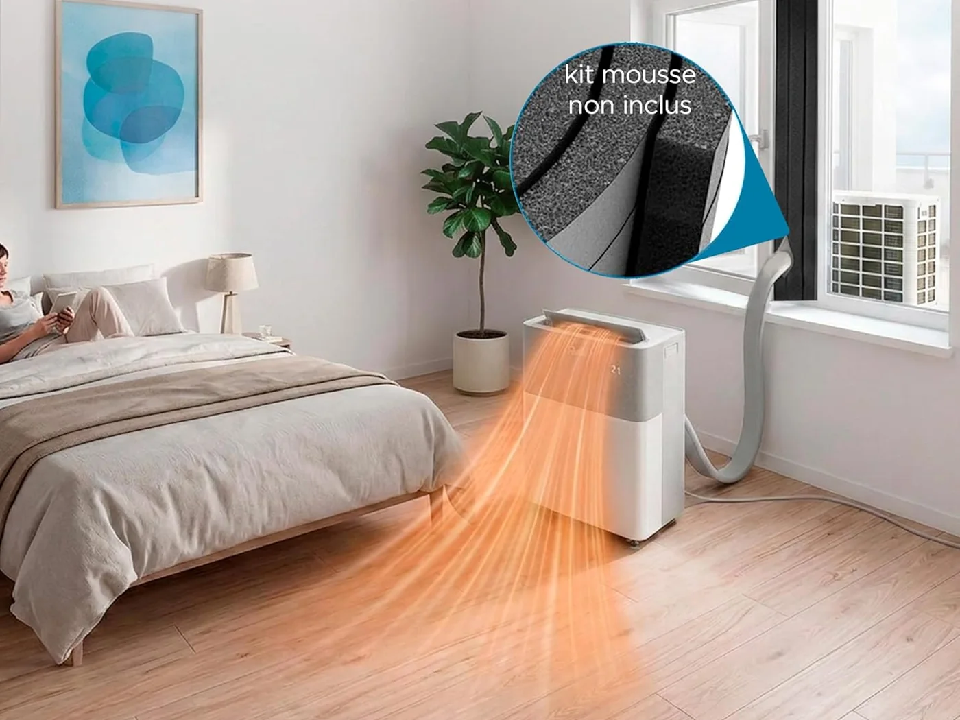 Flux d'air descendant pour le chauffage : le PortaSplit diffuse l'air chaud vers le sol d'une chambre, le long du lit